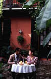 Couple Dining in Courtyard