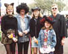 Costumed Revelers at Mardi Gras