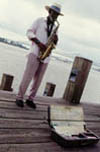 Sax Player On the Mississippi River