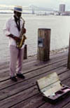 Sax Player On the Mississippi River