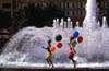 Kids Running Along the Fountain in Spanish Plaza